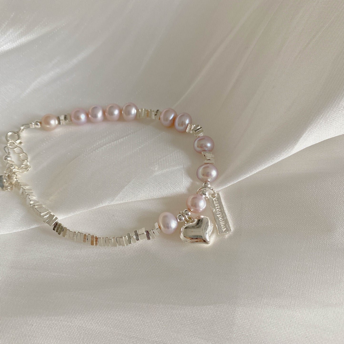 Pulsera de perlas rosas
